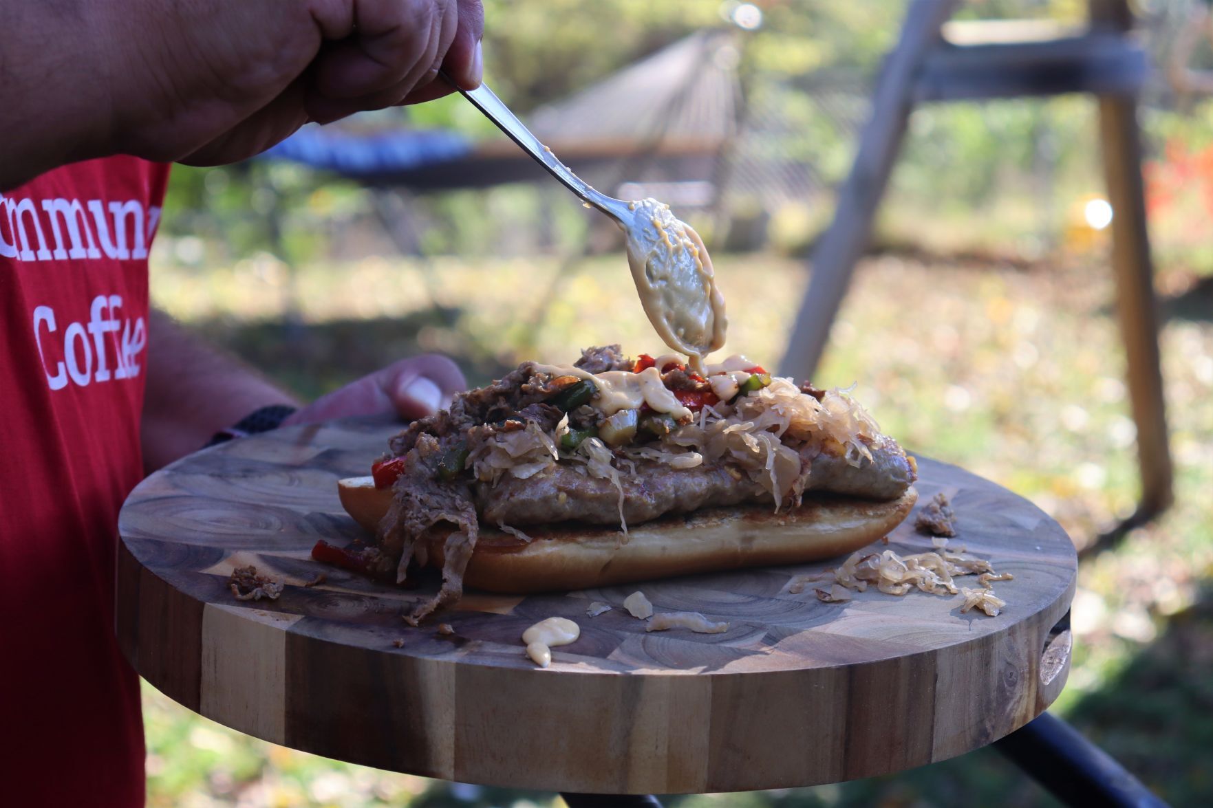 Blake Sykora preparing a Wisconsin cheese steak